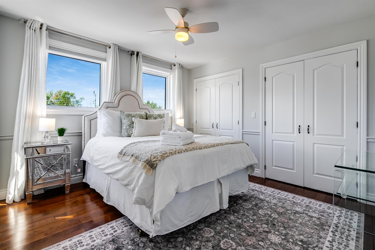 A Queen bed, with a timeless design woven with calm.