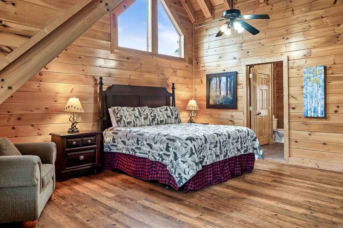 Upstairs master suite with king size bed.