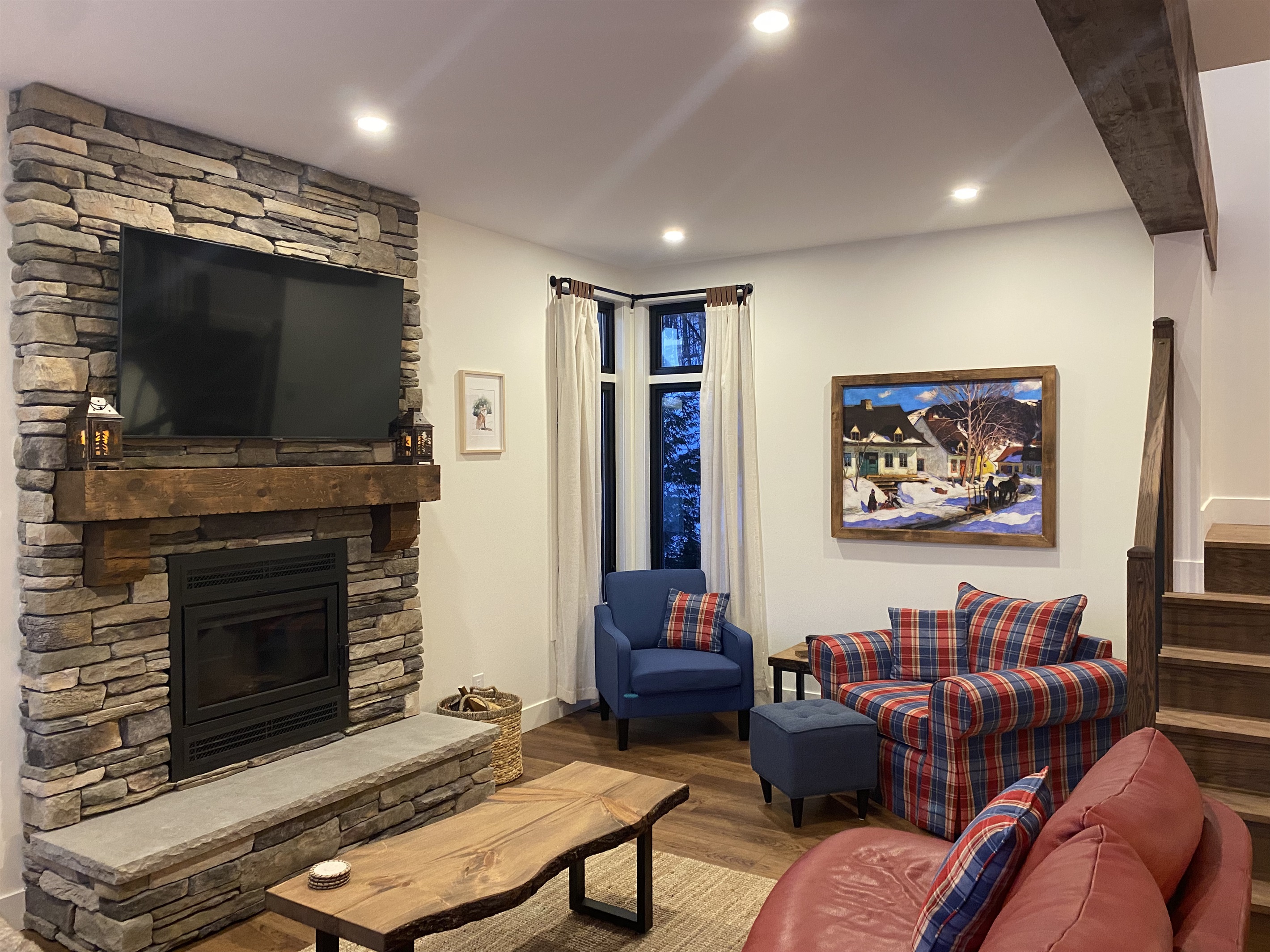 Living room seating options and fireplace