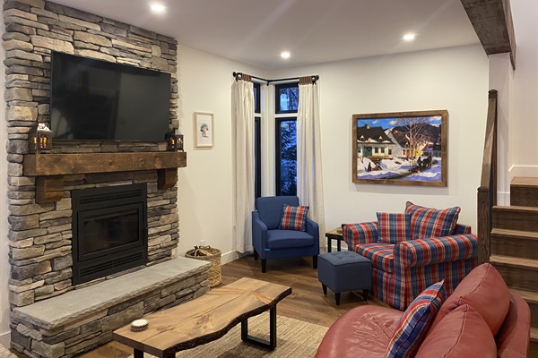 Living room seating options and fireplace