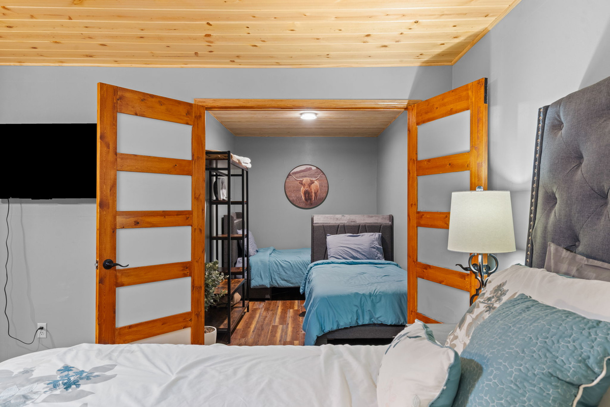 Perfect for families: two twin beds in a private room connected to the King Suite
