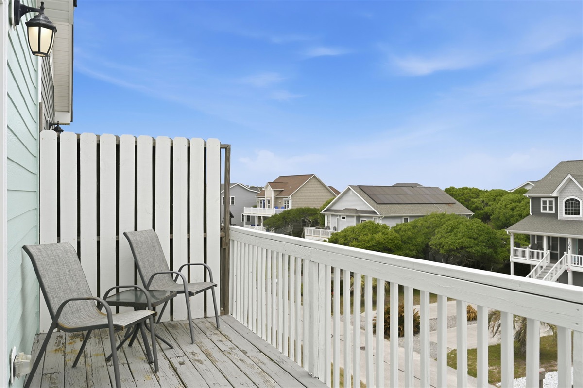 Private deck seating with neighborhood and ocean views
