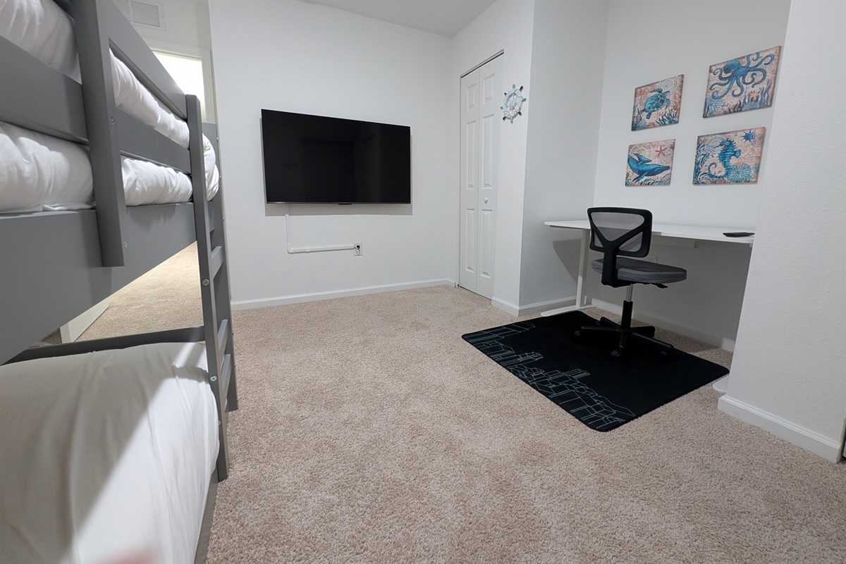 POV from the bunk bed of the workspace and TV