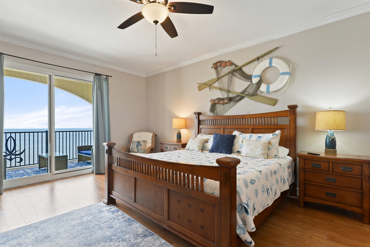 Primary bedroom. King bed, balcony access, en-suite bathroom, tv, etc.
