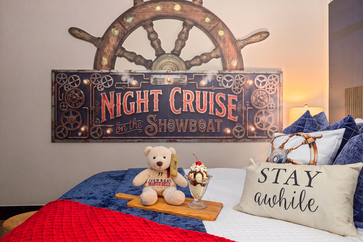 A teddy bear and a sweet treat welcome the little first mates.