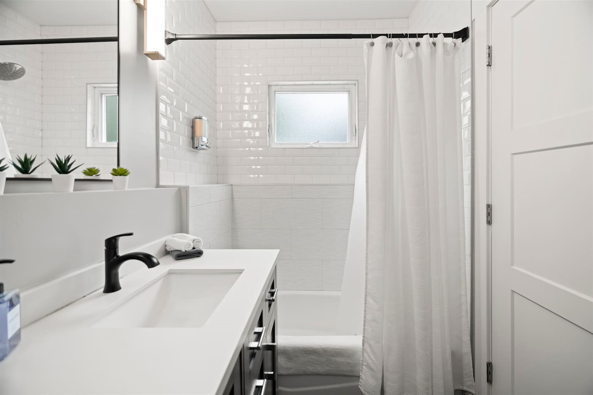 Our spa-inspired bathroom is stocked with thoughtful essentials — from a hair dryer to first aid — so you can pack light and feel right at home.