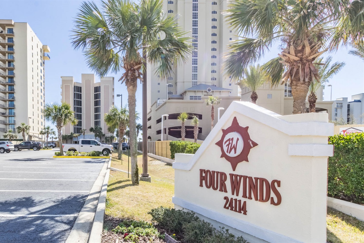 Soaring architecture against a backdrop of clear blue skies and swaying palm trees. Experience the allure of beachfront living.