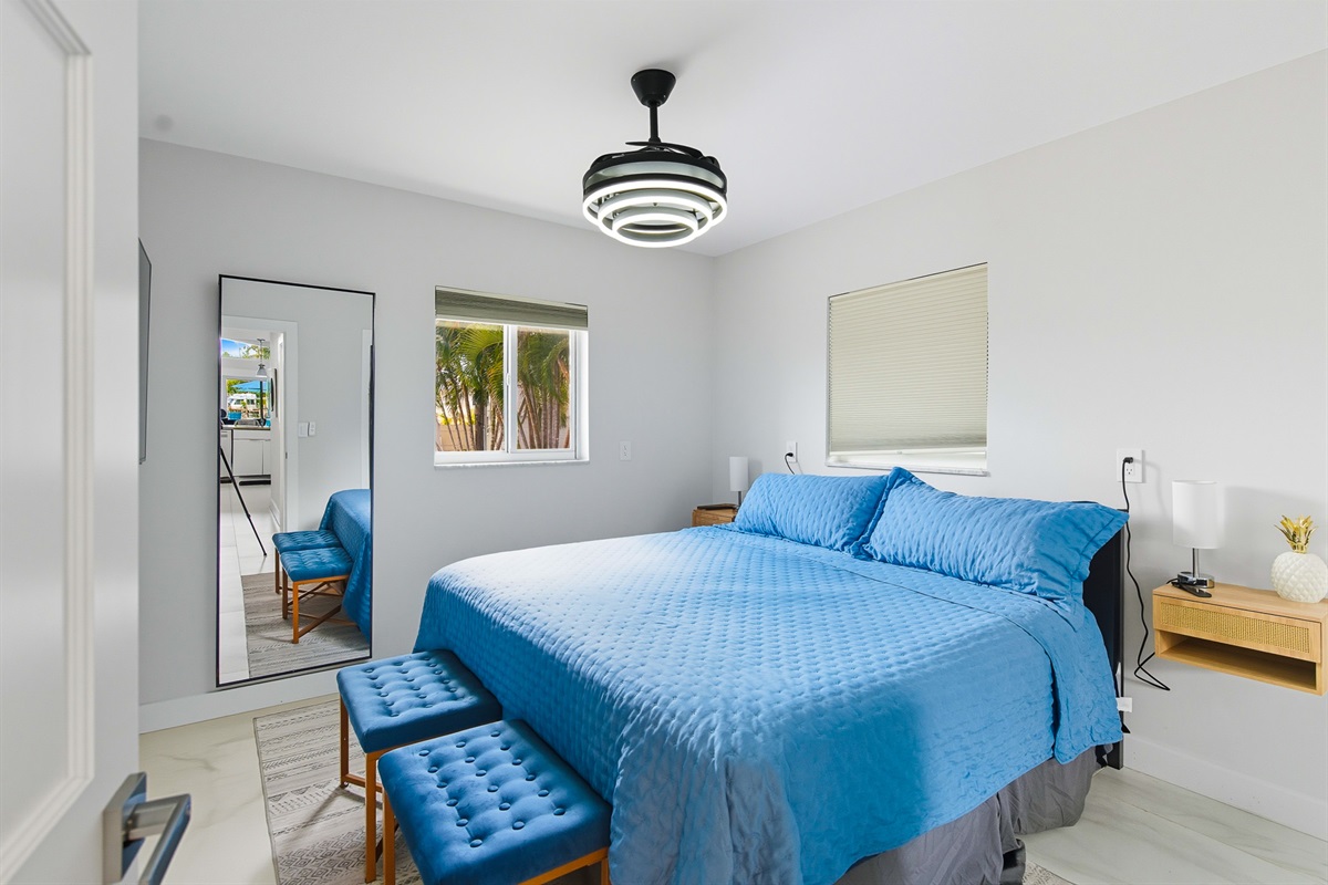 Bedroom 4 on the ground floor offers a king bed, smart TV and full bathroom adjacent but not connected.