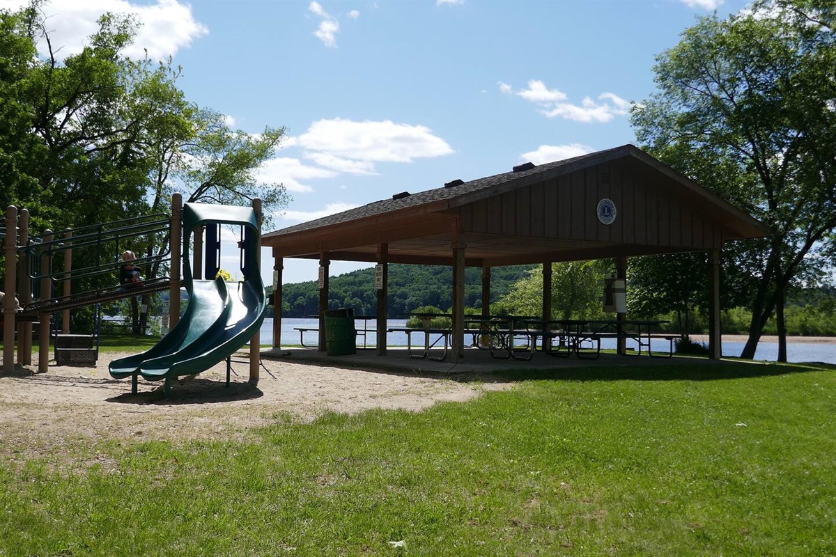 A park across the street is perfect for a family picnic (beach, playground, shelter)