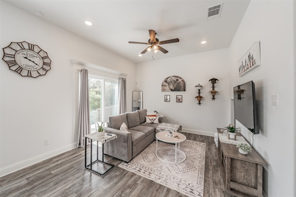 Living area with access to the back yard