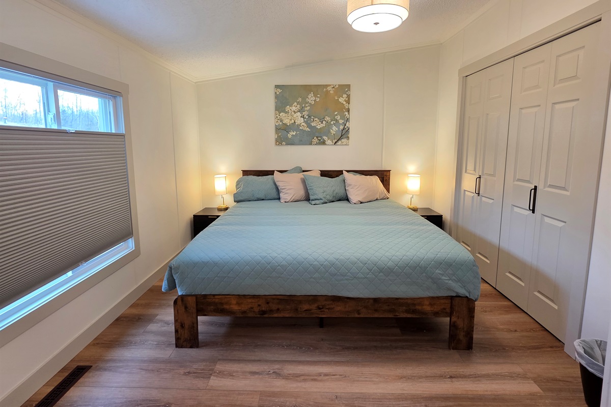 Ensuite Bedroom #1-King size bed.