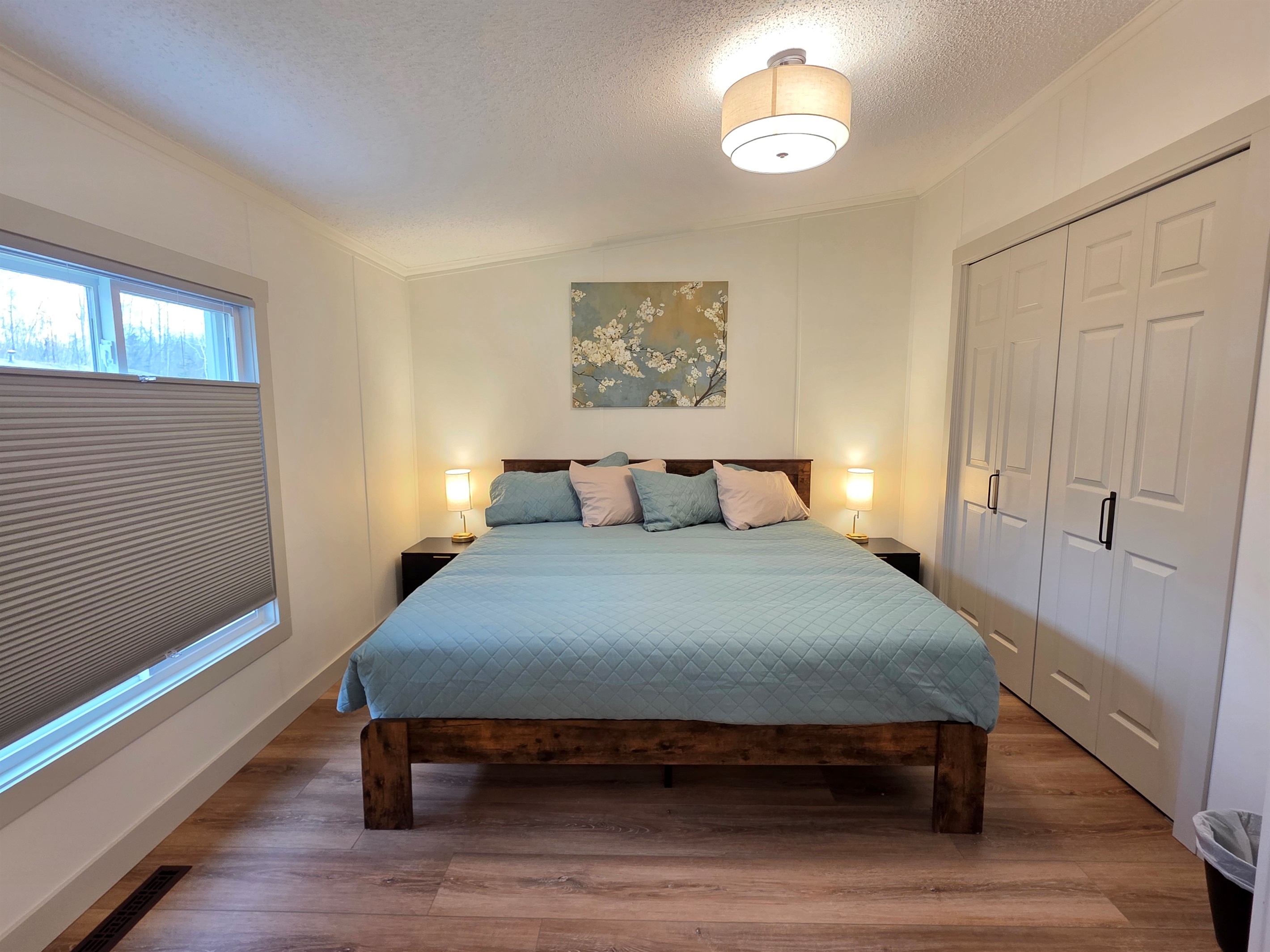 Ensuite Bedroom #1-King size bed.