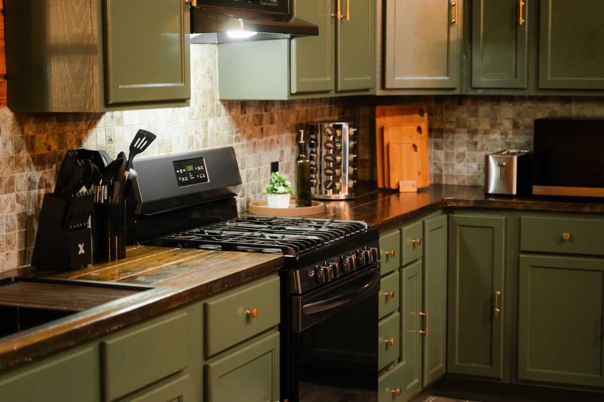 Fully equipped kitchen with plenty of space for preparing meals together.