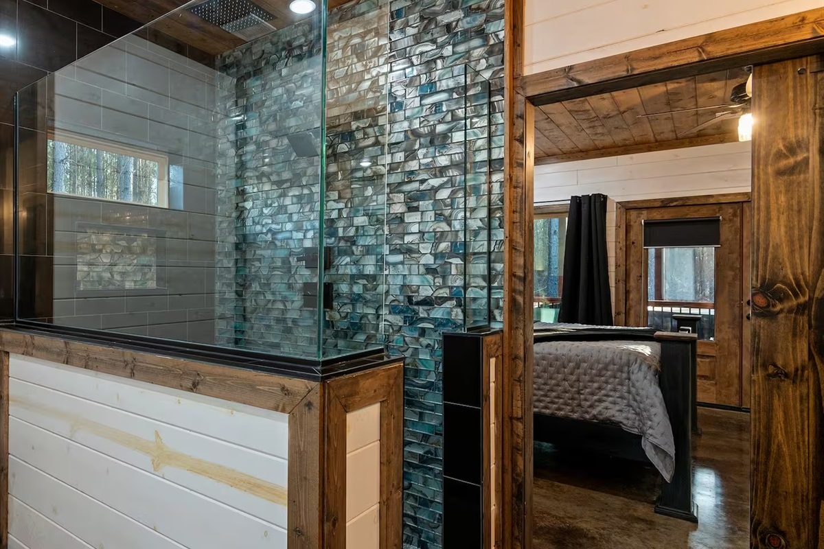 Walk-in showers, granite vanities, and warm lighting elevate your stay with hotel-level luxury.