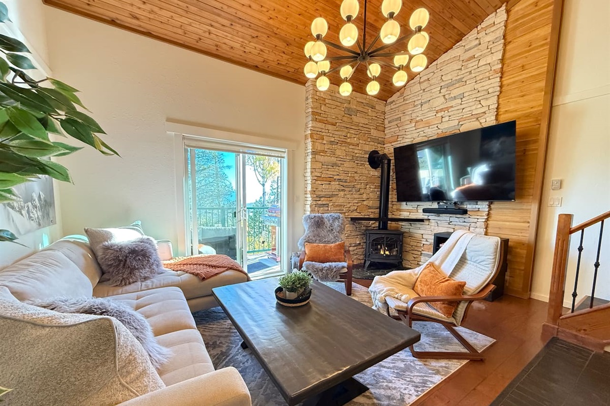 Gas fireplace, 78” TV & deep-seat comfort—I believe in cozy mountain living.