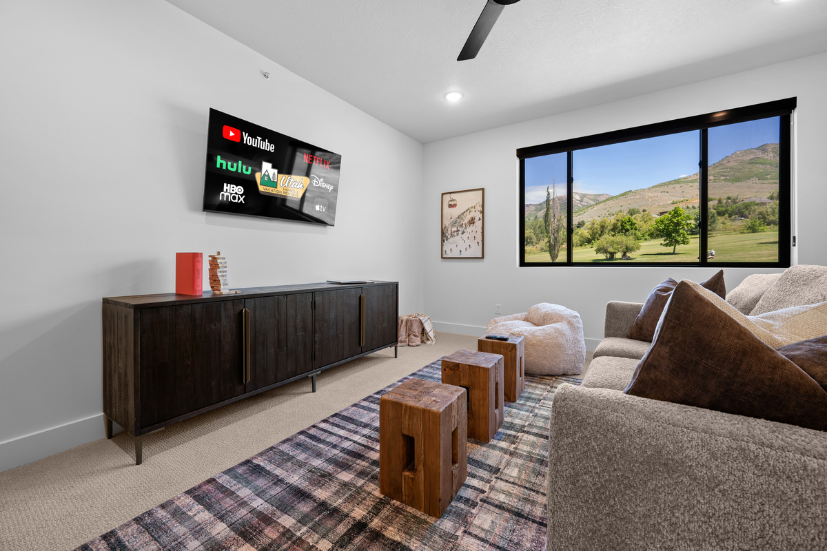 The upstairs media and bunk room offers additional space for everyone to spread out.