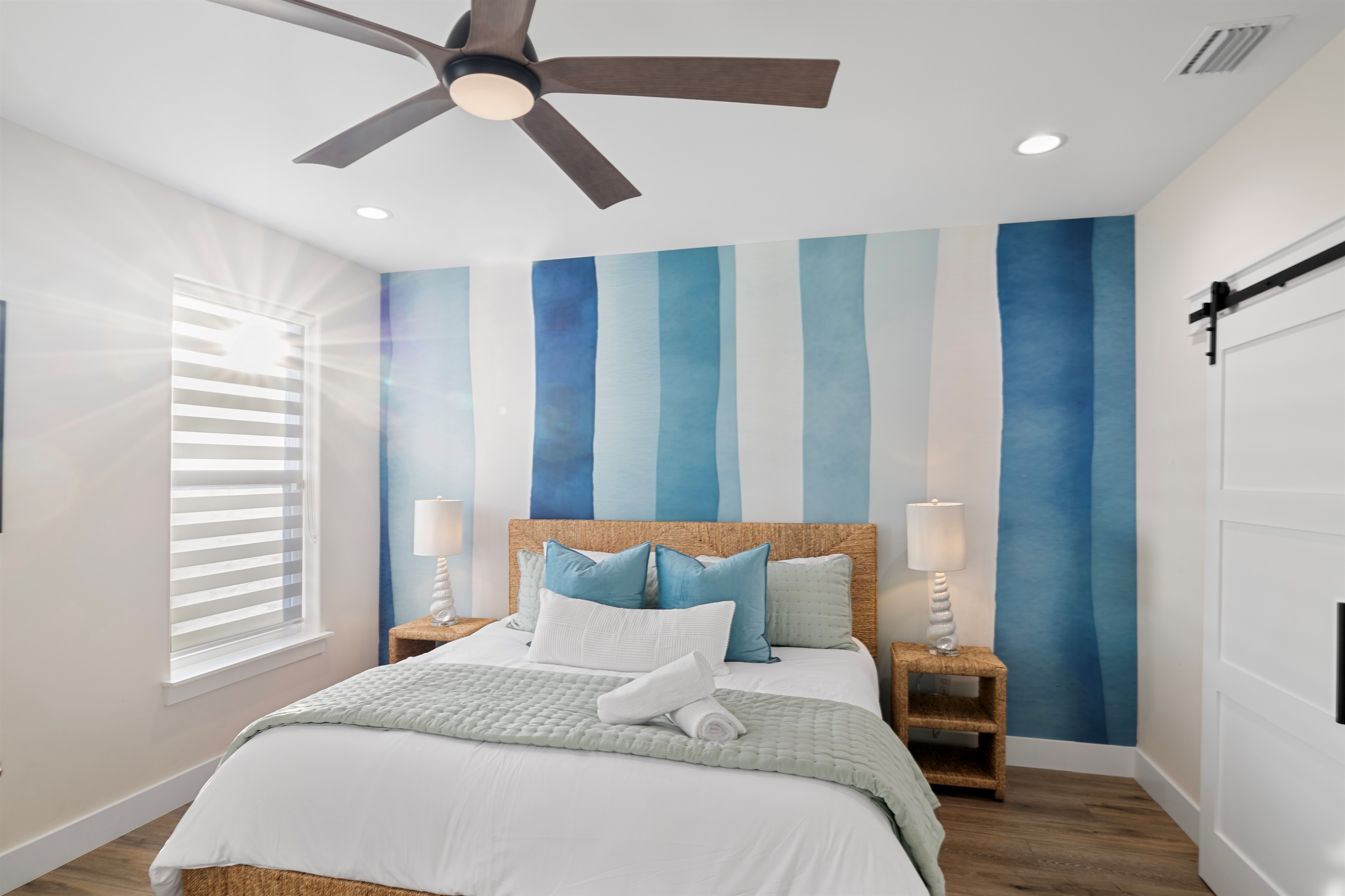 Second-Floor Master Suite – King bed, spa-style ensuite bath, and a bright, coastal retreat designed for total relaxation.