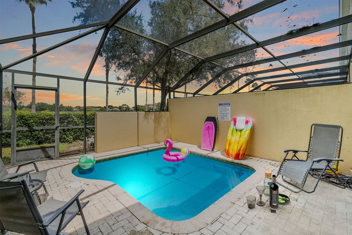 - Screen enclosed pool area with comfortable lounge chairs and pool toys  
- Relax with a refreshing swim or soak up the sun in a private setting  
- Perfect for family fun, poolside games, and evening dips under the sky  