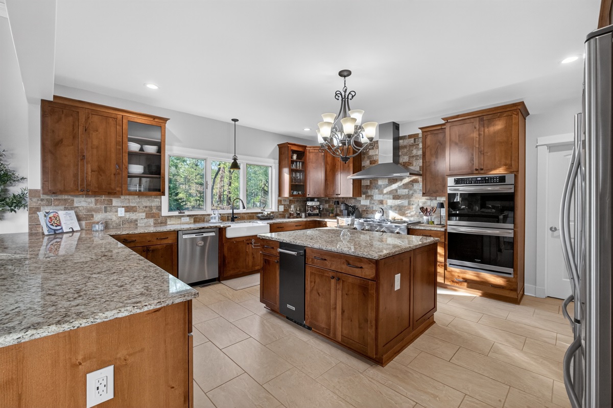 Spacious chef's kitchen with oversized island for gathering