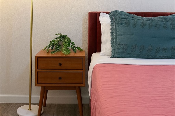 bedroom 2 Inviting golden girls design, door to full bath, black out curtain that combines comfort with functionality