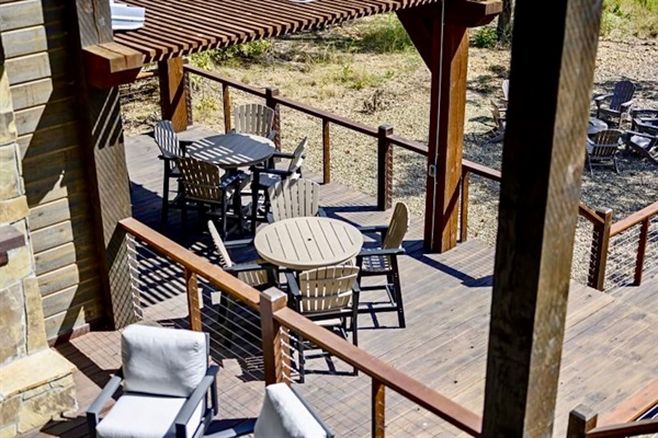 Al fresco dining, fireside stories, and peaceful pond scenery—this is outdoor living perfected.