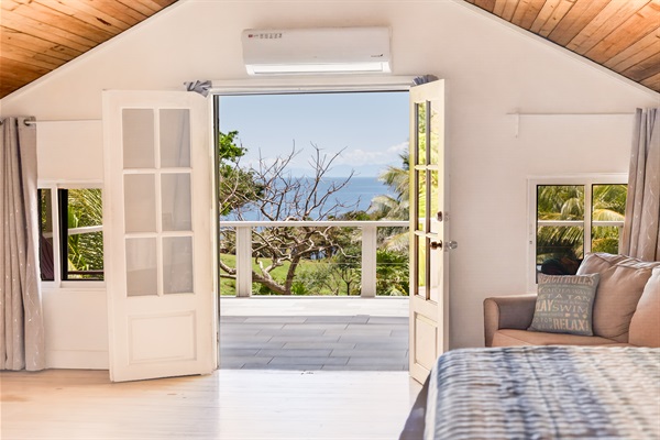 Master suite opens to the top deck and views of the sunrise and the mainland