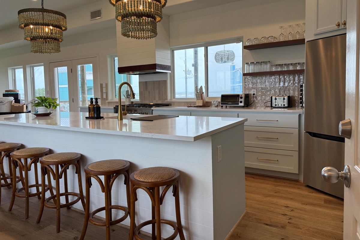 Welcome to the Sunrise Sunset Retreat! Best loaded beach house on the Island! Only Roof Top Bar in a Vacation Rental!