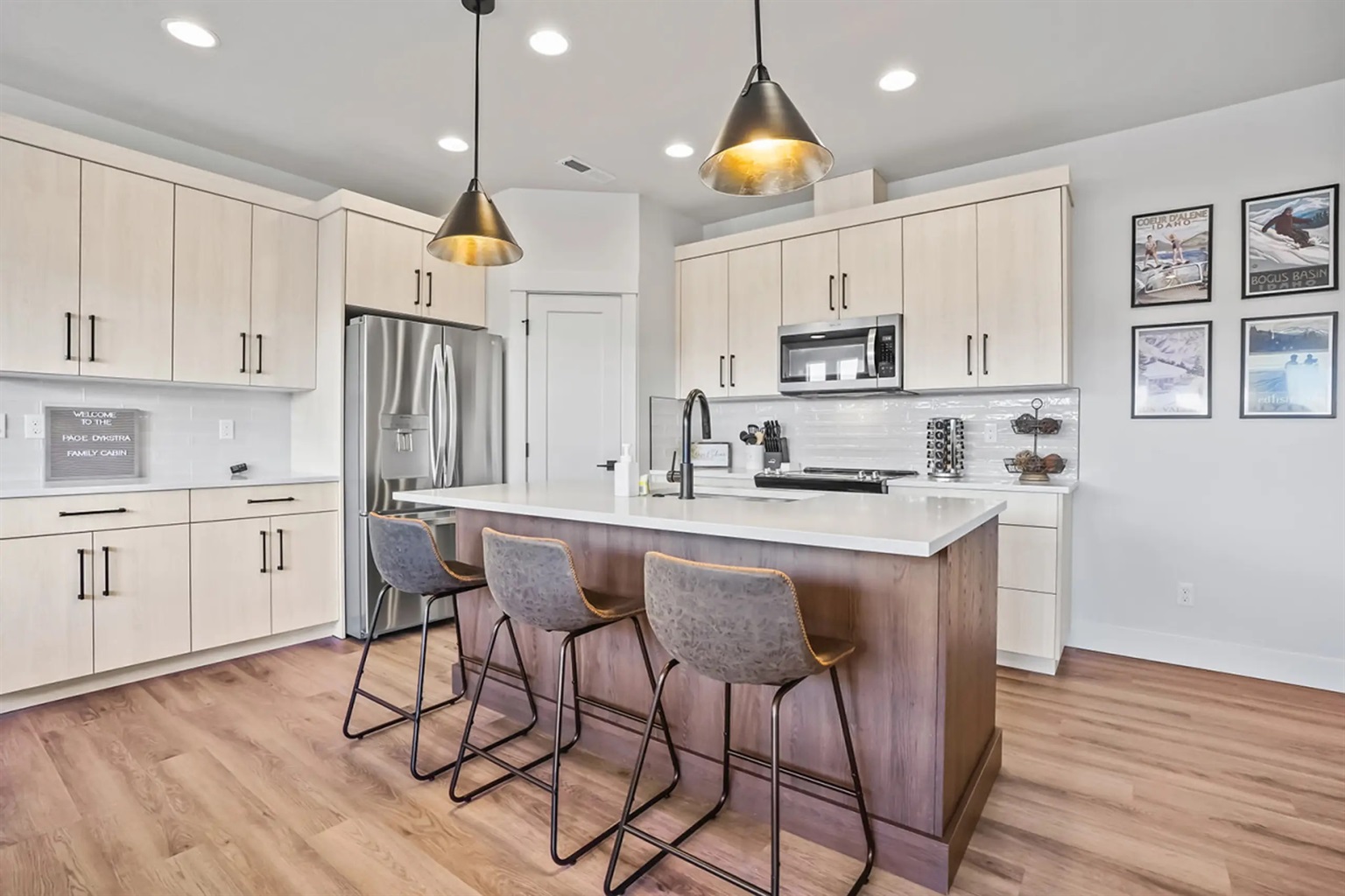 Modern kitchen with stainless steel appliances and a spacious island for cooking and gathering