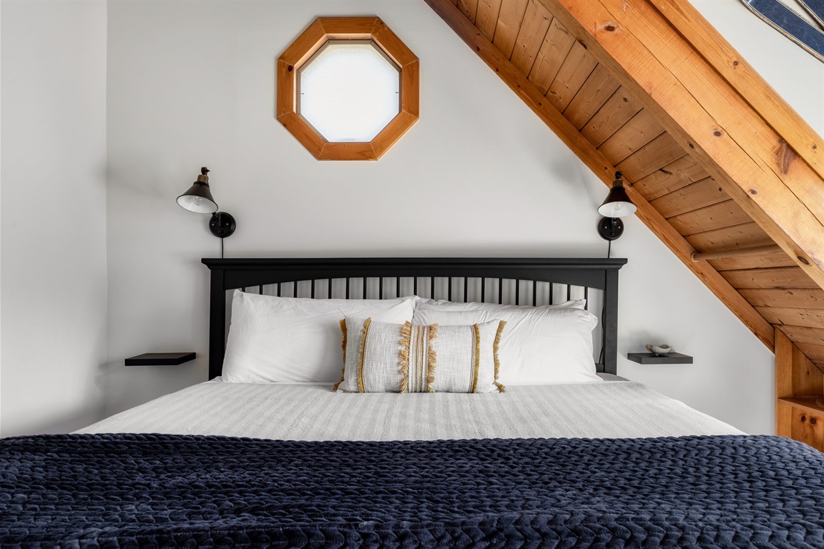 comfort and luxury with our spacious bedroom featuring a king-sized bed fit for royalty.