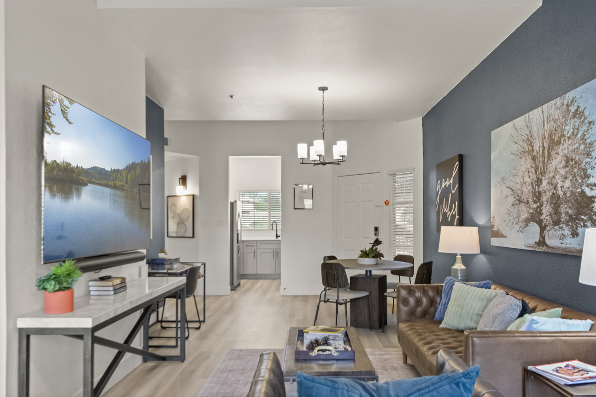 Open-concept living space connecting the dining and lounge areas, creating a comfortable setting for spending time together.
