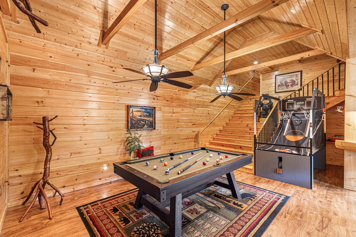 Game Room: Enjoy friendly competition with pool and arcade games in a spacious, inviting space!