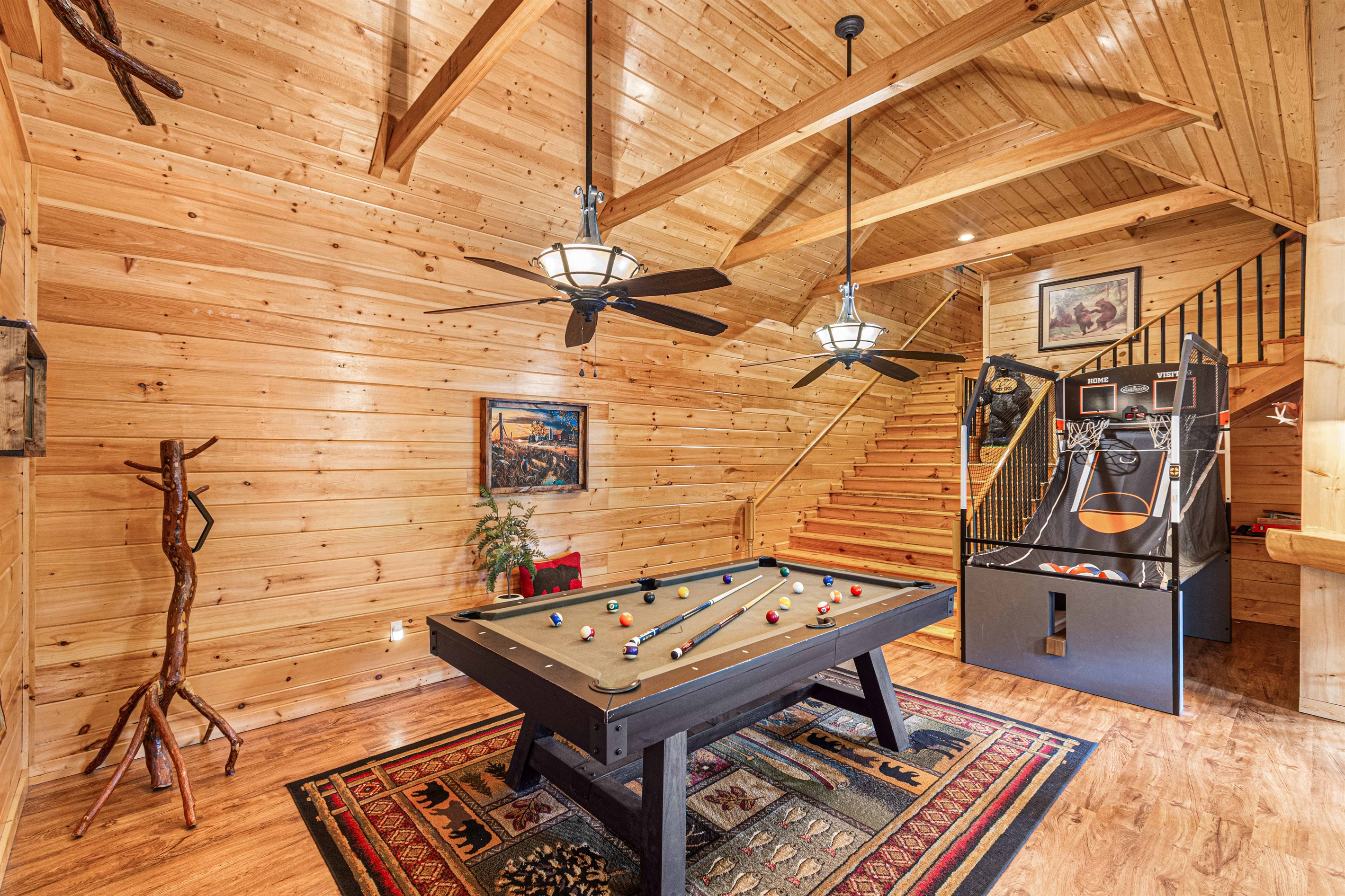 Game Room: Enjoy friendly competition with pool and arcade games in a spacious, inviting space!