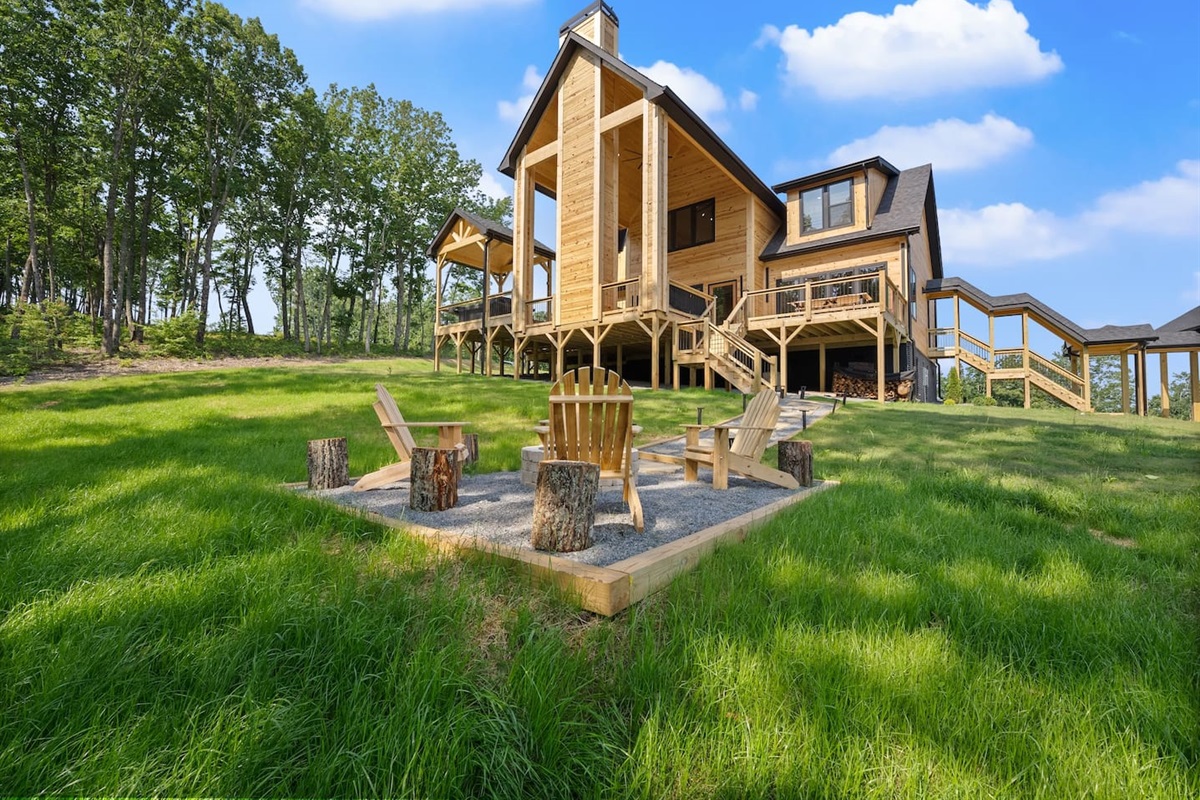 Relax with your group in this spacious green backyard, complete with scenic views and crackling flames.