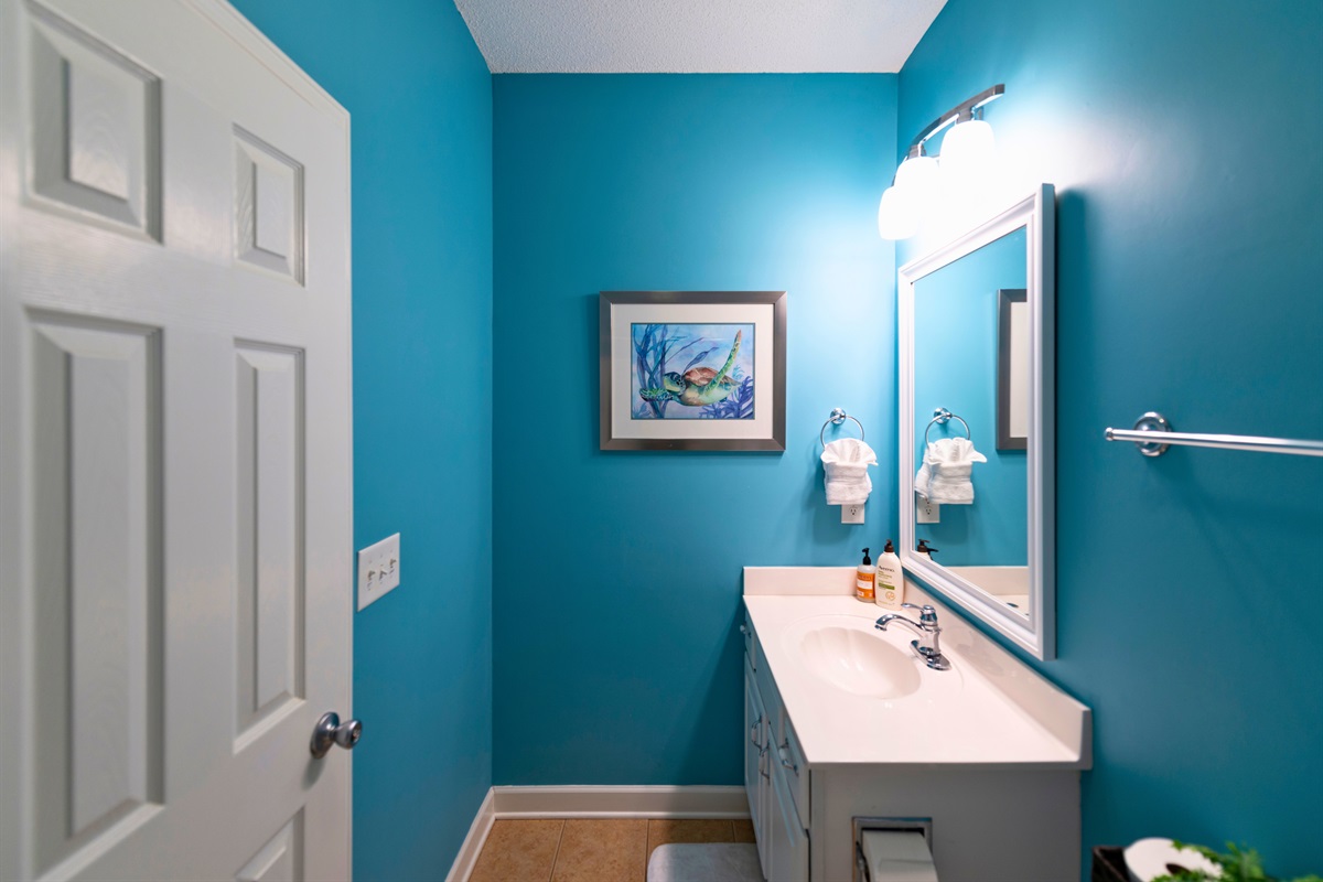 [Bathroom] The Bunk Room has an En Suite Bathroom with a Shower/Tub Combo.