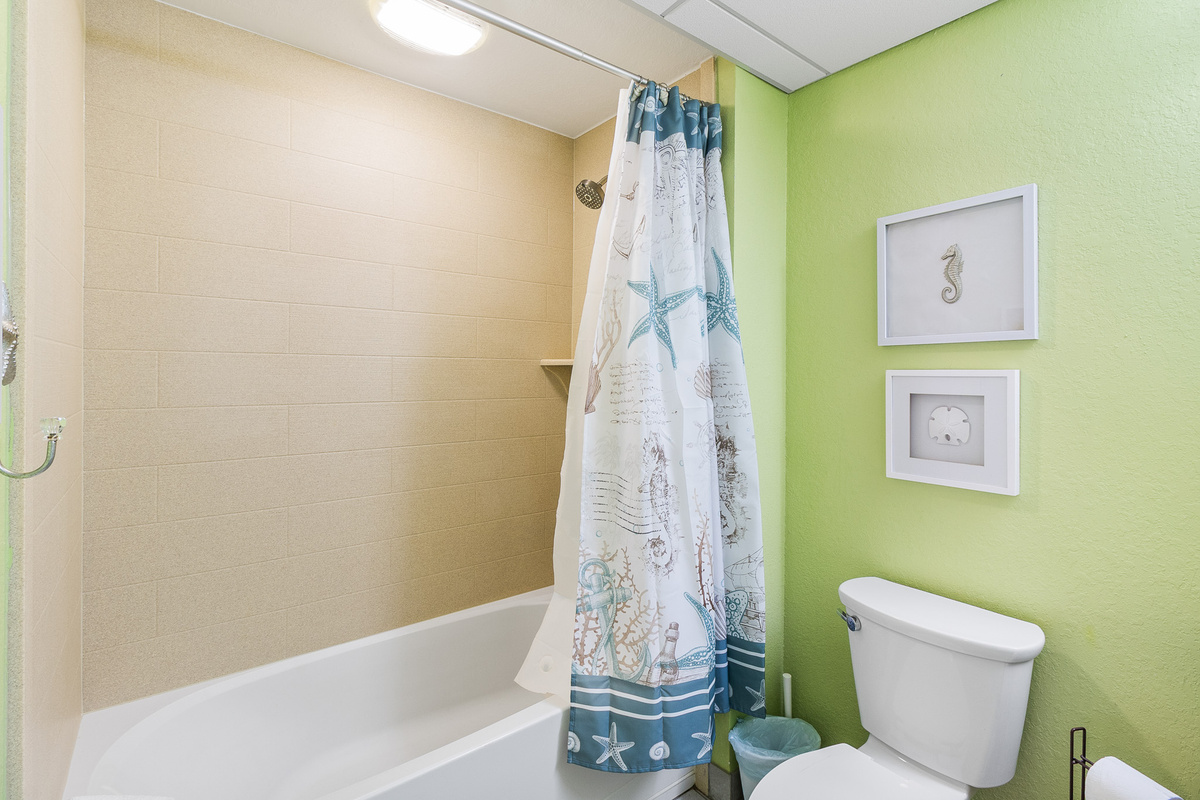 Guest bath in 2nd Bedroom, shower/tub combo.