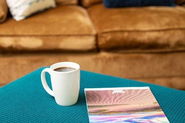 Sit back with a warm coffee and a good book in hand, your perfect quiet moment of calm and comfort.