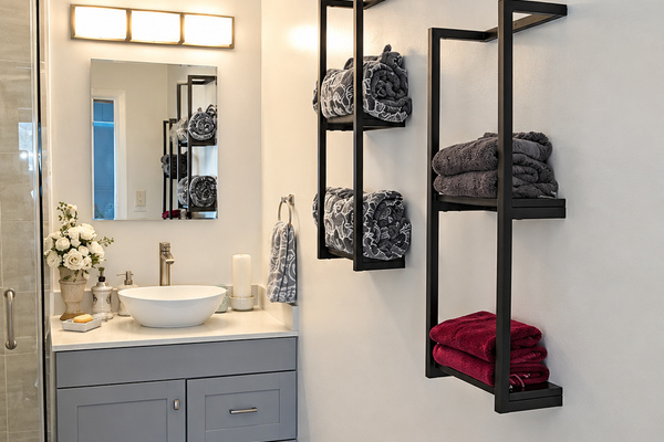 Clean and comfortable bathroom with a walk-in shower, providing a convenient space to freshen up after a day by the lake.