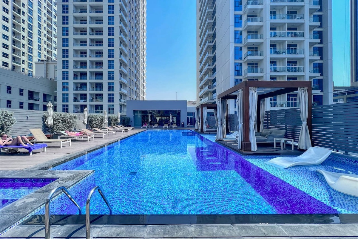Stunning swimming pool with temperature controlled water, Jacuzzi, sunbeds and cabanas free for guests
