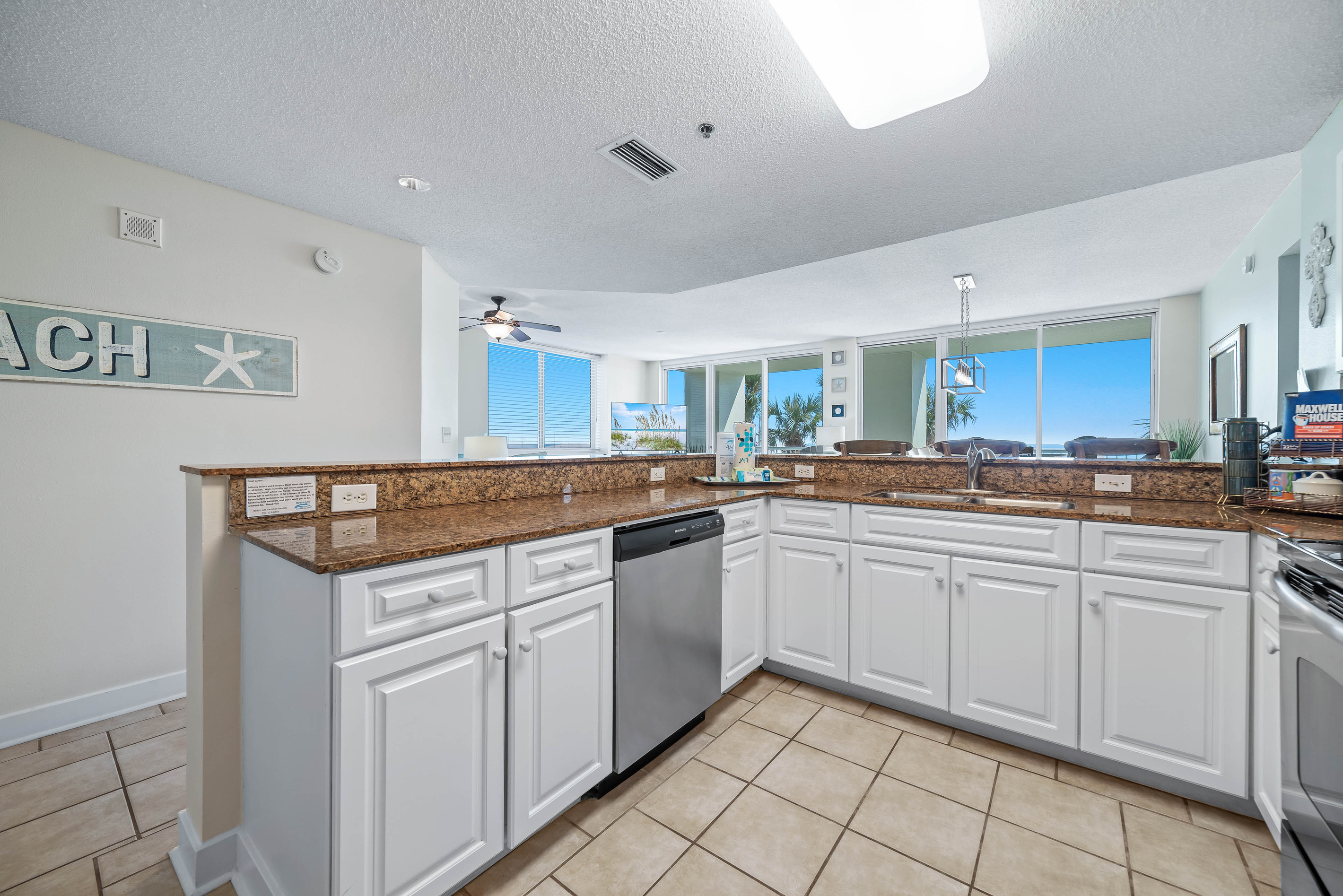 The open layout allows for seamless interaction between the kitchen and living areas, perfect for hosting gatherings.