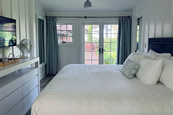 PRIMARY BEDROOM - double doors to front patio (pro photos coming soon)