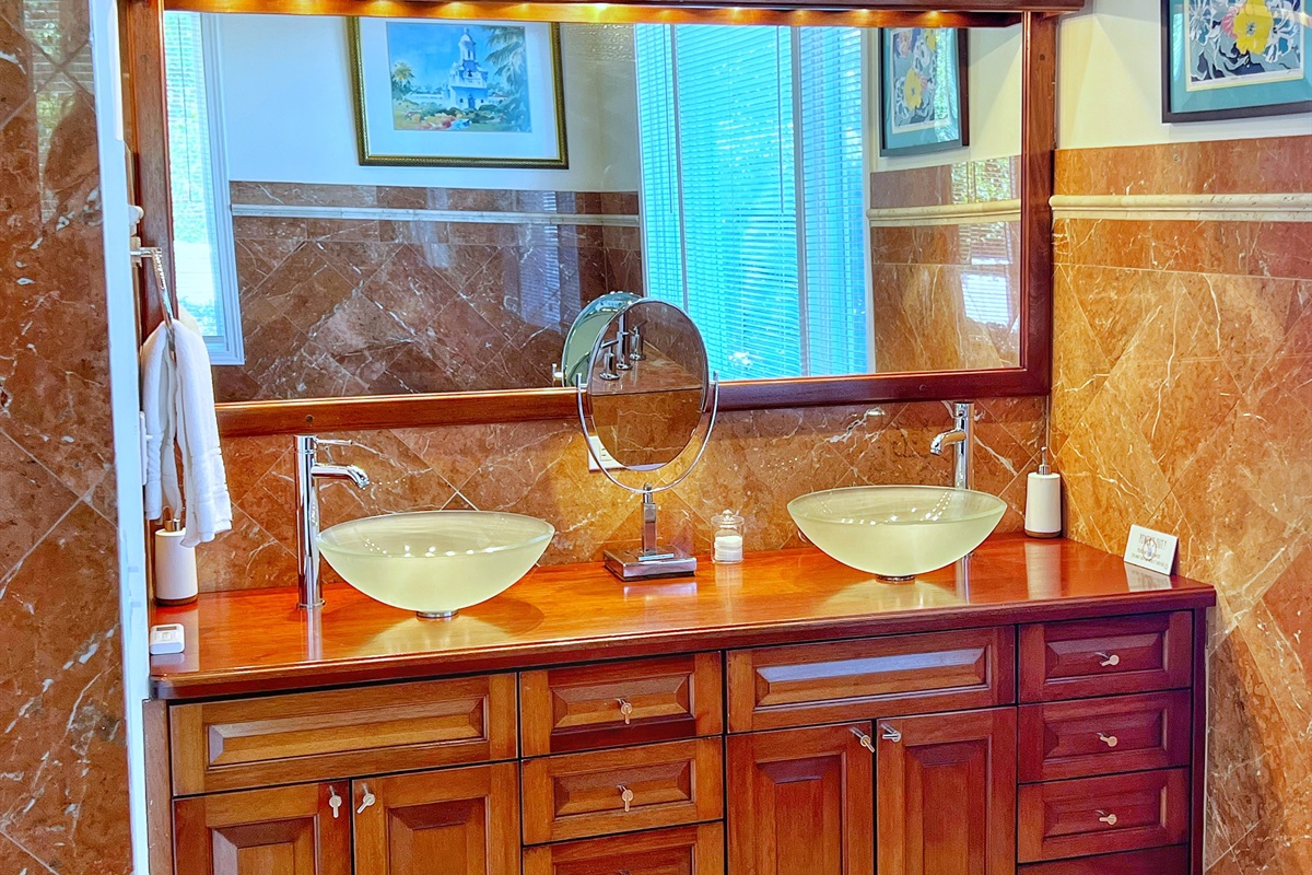 The primary ensuite bathroom is bright, clean, and thoughtfully designed for your comfort.