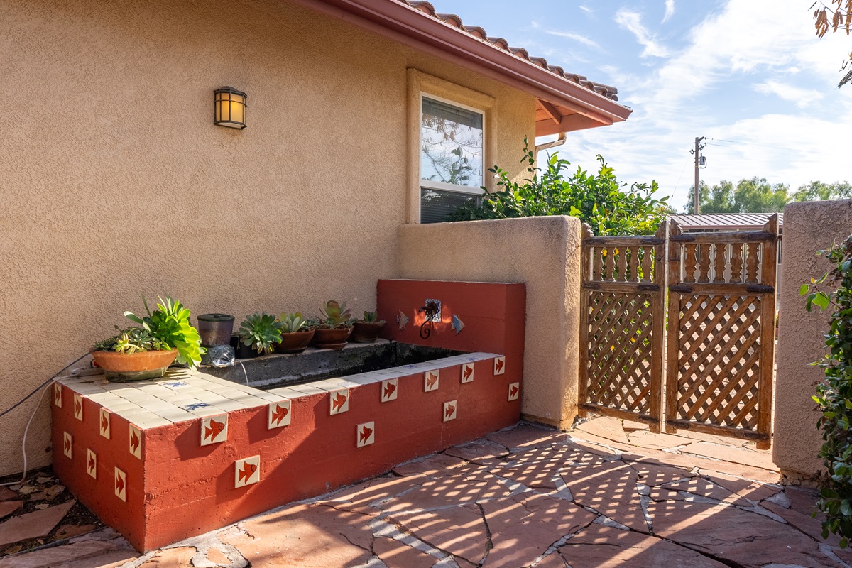 You will be greeted by the sound of running water from the fish pond.