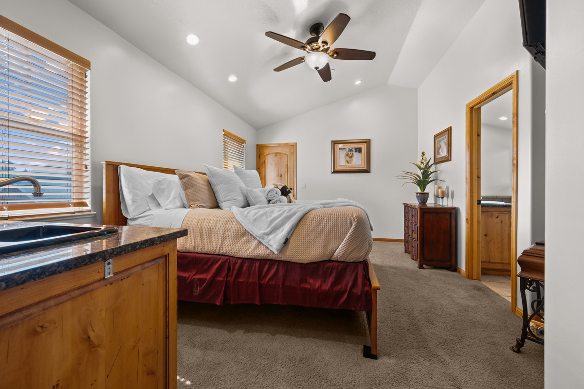 The expansive fourth bedroom has an ensuite bathroom.