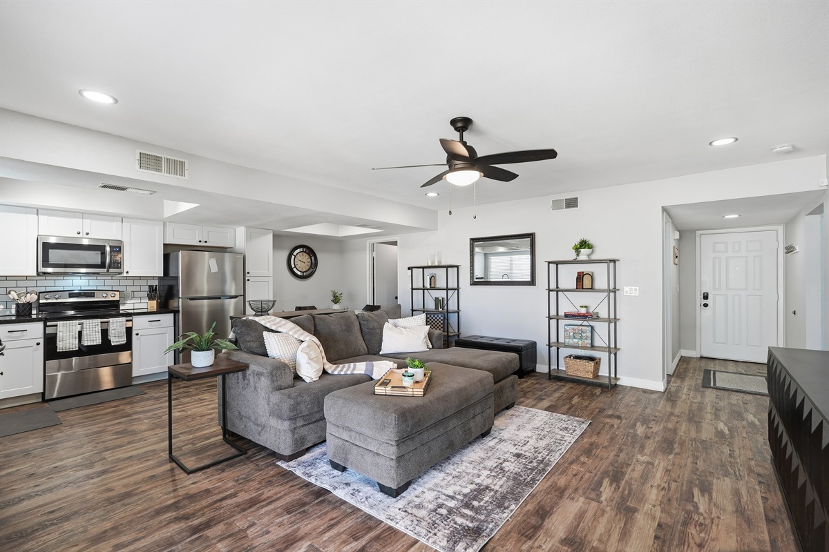 Modern open-concept retreat with full kitchen, cozy living area, and stylish comfort.