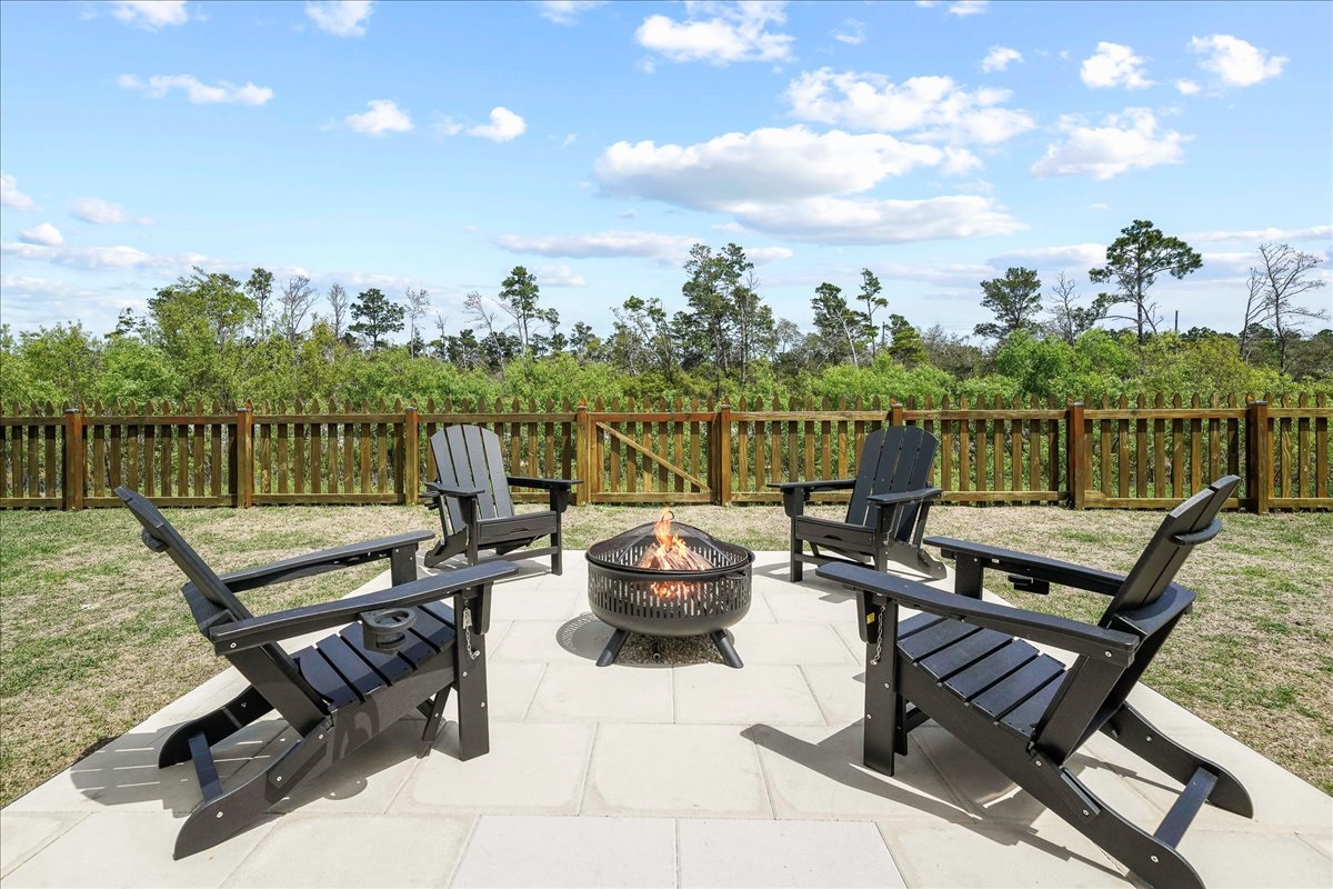 Cozy up by the fire pit and enjoy peaceful nights under the open sky