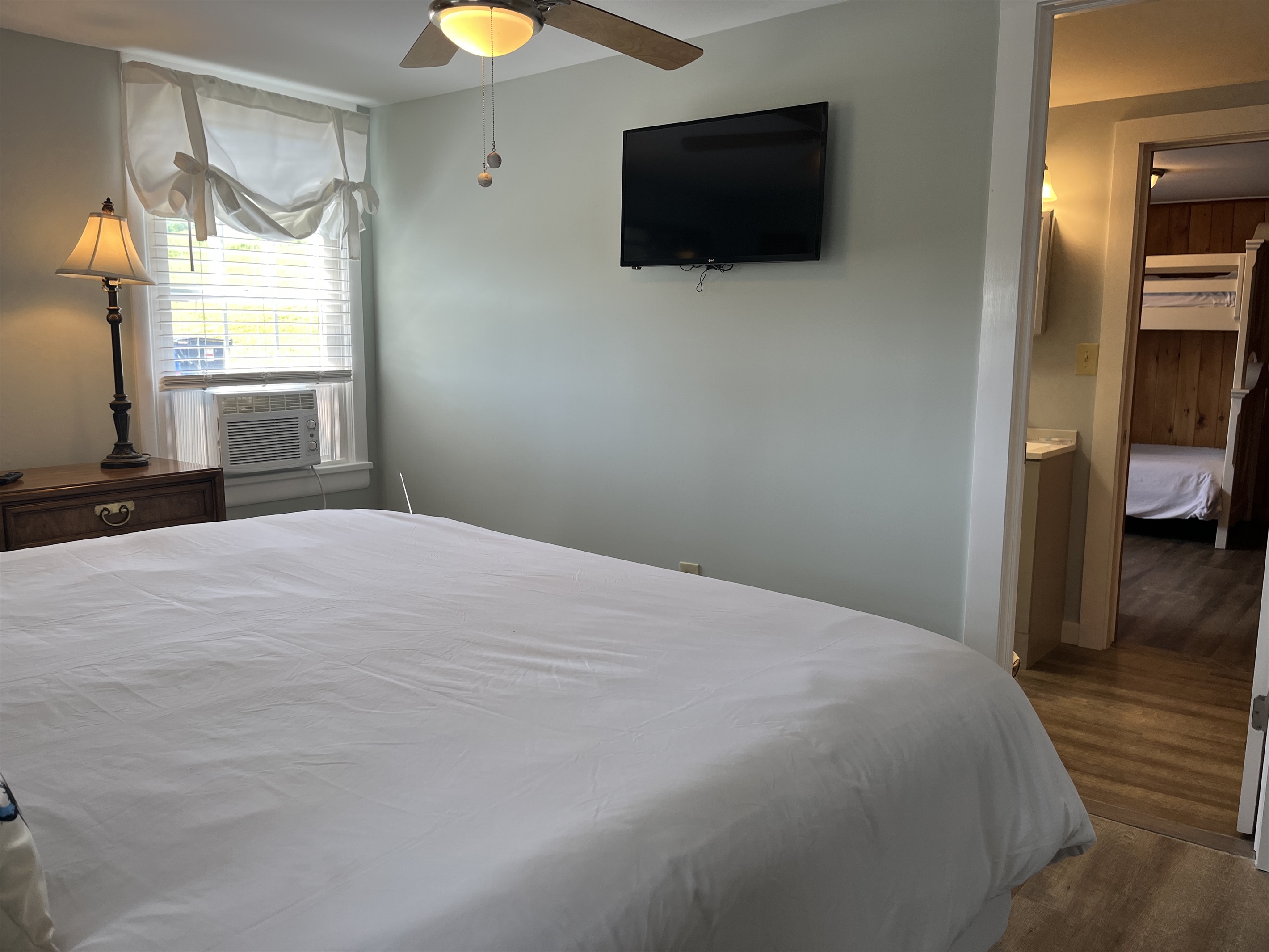 Roundtripper 1st floor King bedroom with smart TV and J&J connecting bathroom.