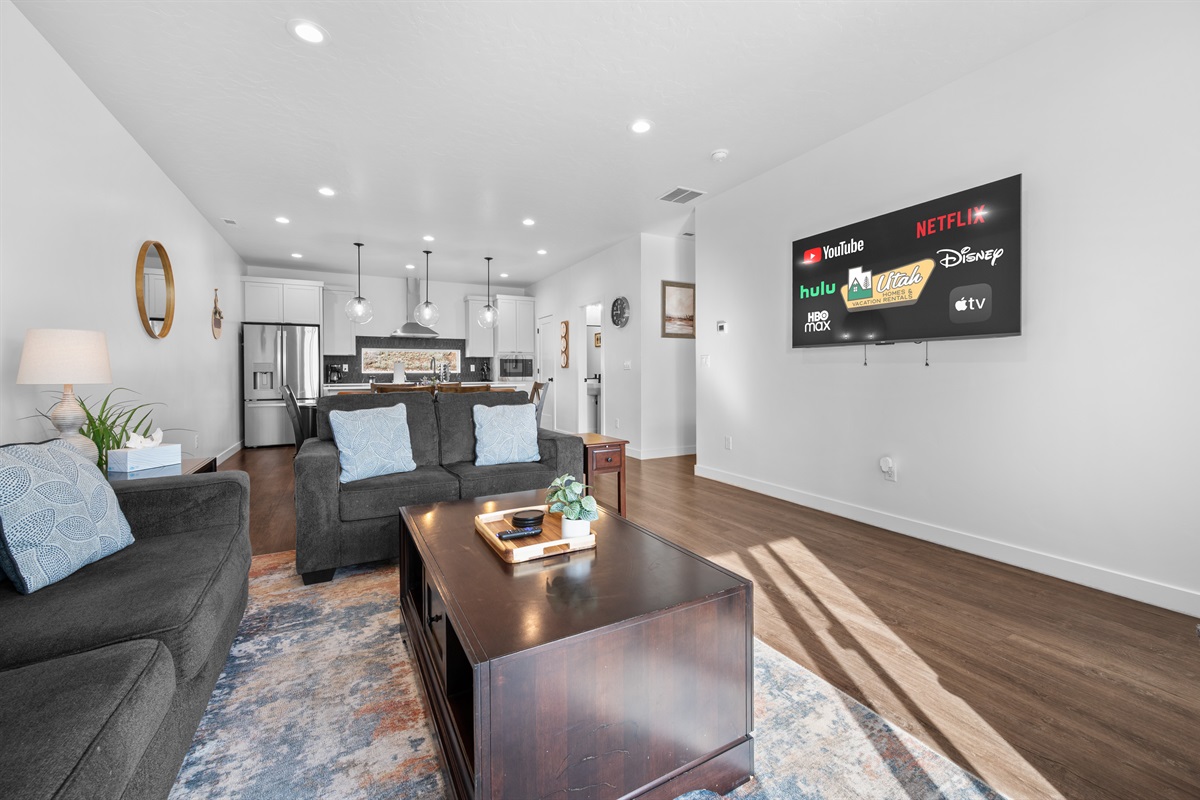 Spacious living room with open-concept layout—perfect for gathering.