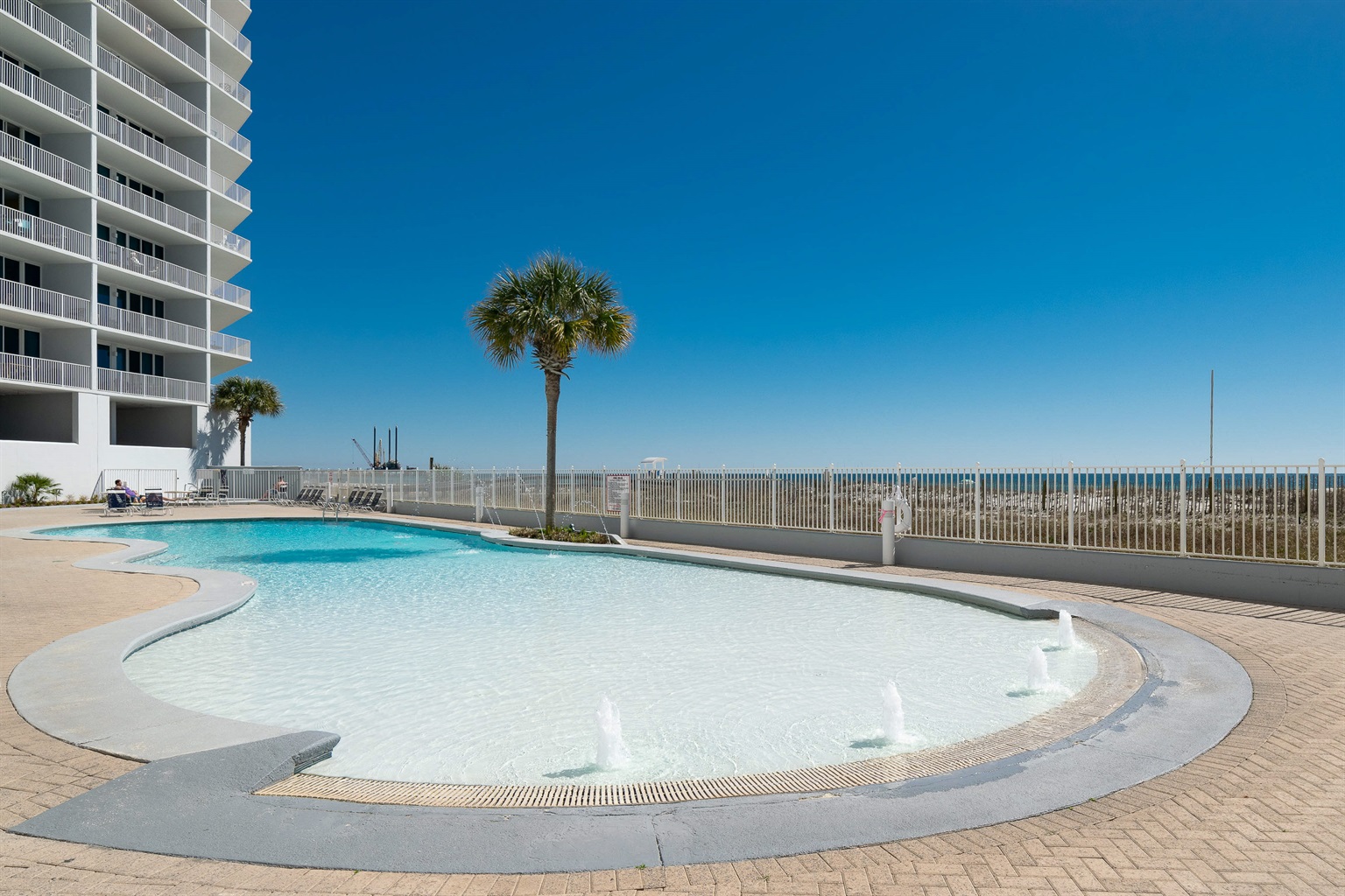 Perfect for all ages! Our Lighthouse Condo amenities include a beautiful zero-entry pool with playful water fountains for the kids to enjoy.