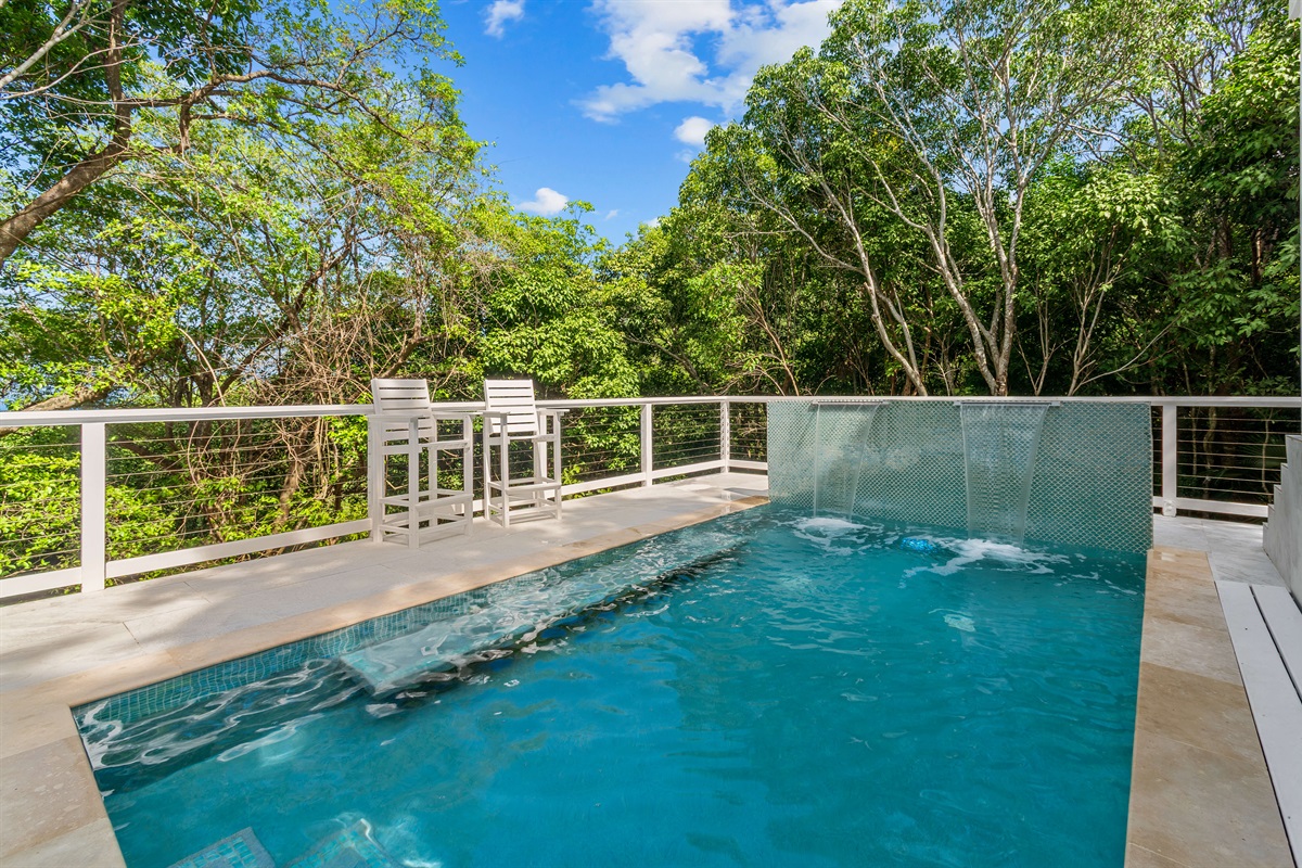 This home comes with a private pool with a waterfall wall feature all to yourselves!