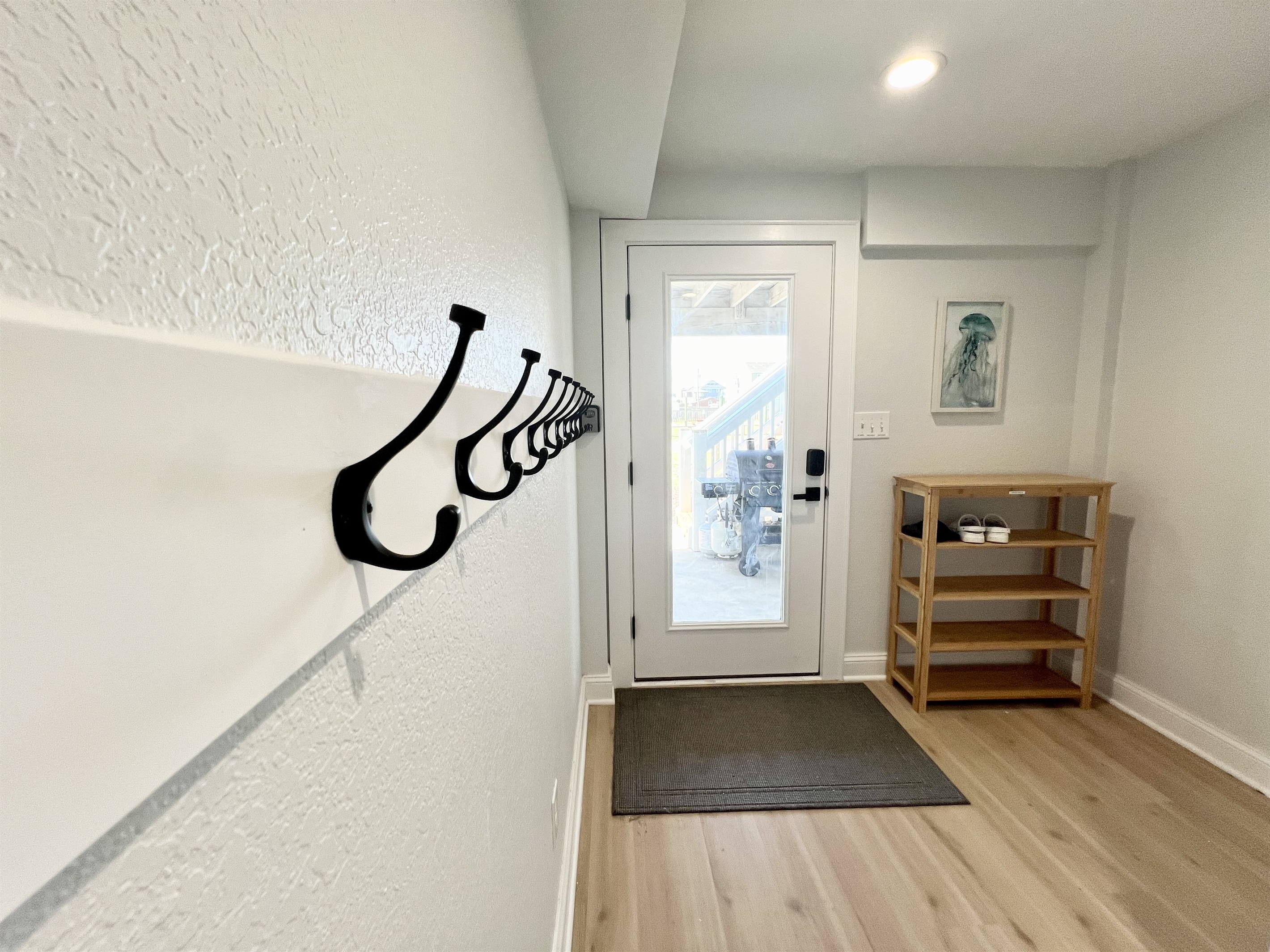 Plenty of hooks and a shoe rack!